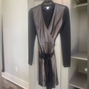 Worn once DVF leather wrap dress. Sleeves and back of dress combo material